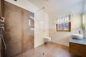 Ein Badezimmer in der Unterkunft R&R Residenzen Aparthotel