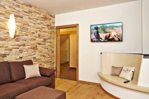 Ein Sitzbereich in der Unterkunft R&R Residenzen Aparthotel