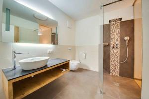 Ein Badezimmer in der Unterkunft R&R Residenzen Aparthotel