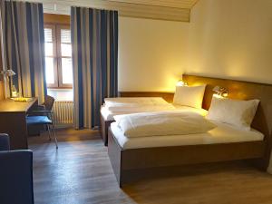 Postel nebo postele na pokoji v ubytování Tagungshaus Wernau