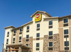 a hotel building with a burger king sign on it at My Place Hotel-Council Bluffs/Omaha East, IA in Council Bluffs