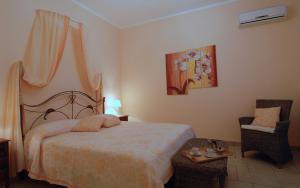Postel nebo postele na pokoji v ubytování B&B Villa Vittoria + 45 fotografií