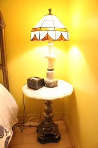Postel nebo postele na pokoji v ubytování La Loggia Art B&B