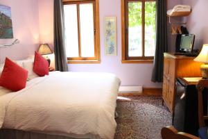 Postel nebo postele na pokoji v ubytování La Loggia Art B&B