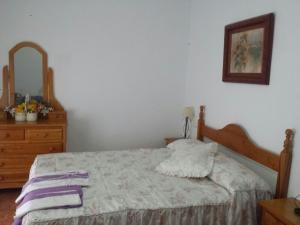 Postel nebo postele na pokoji v ubytování Los Olivos