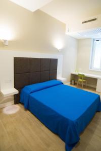 Posteľ alebo postele v izbe v ubytovaní B & B REGINA MARGHERITA
