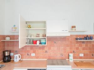 A kitchen or kitchenette at A Casa Di Clementina Még 37 kép