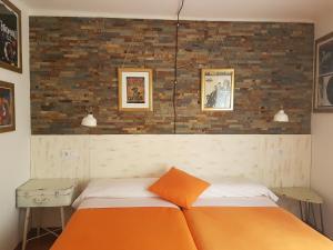 Katil atau katil-katil dalam bilik di Barri Antic Hostel & Pub