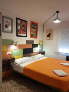 Katil atau katil-katil dalam bilik di Barri Antic Hostel & Pub