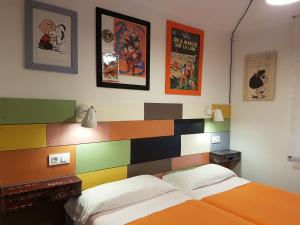 Katil atau katil-katil dalam bilik di Barri Antic Hostel & Pub