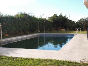 a swimming pool in the middle of a yard at Balcon del mar in Morche