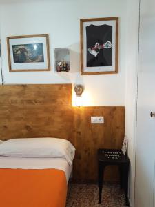 Katil atau katil-katil dalam bilik di Barri Antic Hostel & Pub
