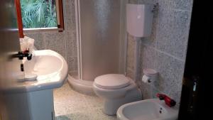 Koupelna v ubytování Il Gelsomino + 14 fotografií