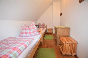 Postel nebo postele na pokoji v ubytování Ferienhaus Dirnbacher Hütte