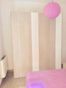 A bed or beds in a room at Residenza Sant'Orsola Azzurra Mazzini