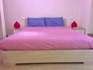 A bed or beds in a room at Residenza Sant'Orsola Azzurra Mazzini