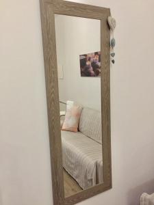 A bed or beds in a room at Residenza Sant'Orsola Azzurra Mazzini