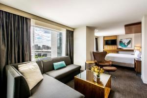 
a living room filled with furniture and a window at Hyatt Regency McCormick Place in Chicago
