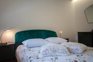 Postel nebo postele na pokoji v ubytování Zen & Art suite
