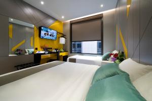 Hotel Mi Bencoolen電視和／或娛樂中心