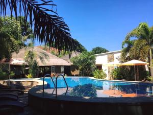 Bazén v ubytovaní Acacia Tree Garden Hotel alebo v jeho blízkosti