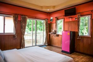 Postelja oz. postelje v sobi nastanitve Koh Tao Garden Resort