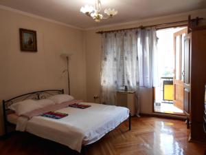 Postel nebo postele na pokoji v ubytování Guest House Marketti