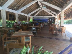 Restoran või mõni muu söögikoht majutusasutuses Costa Azul Suite 606