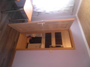 a small drawer in a room with aartments at Pod Kabajka in Polańczyk
