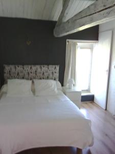 Кровать или кровати в номере la Rosaliere
