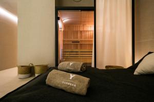 Postel nebo postele na pokoji v ubytování Yurbban Passage Hotel & Spa