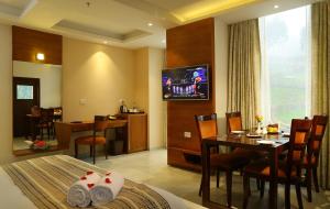 TV a/nebo společenská místnost v ubytování Blanket Hotel & Spa