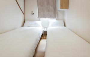 Postel nebo postele na pokoji v ubytování Camping Platja Cambrils