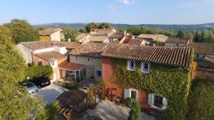 an aerial view of a house with vines at Les Passiflores in Roussillon