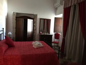 Posteľ alebo postele v izbe v ubytovaní B&B La Staffa