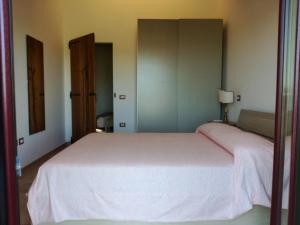 Postel nebo postele na pokoji v ubytování Agriturismo Forestale Luti