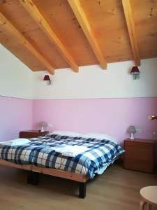 Letto o letti in una camera di I Gelsi e i Castagni