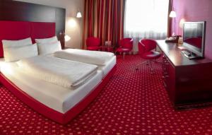 Katil atau katil-katil dalam bilik di Best Western Plaza Hotel Wels