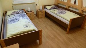 Postel nebo postele na pokoji v ubytování Ferienwohnung Haßmüller
