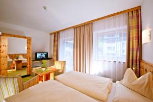 Letto o letti in una camera di Hotel Mathiesn