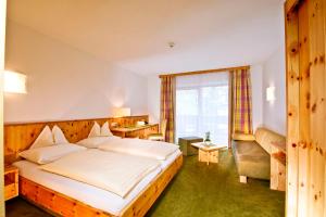 Letto o letti in una camera di Hotel Mathiesn