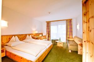 Letto o letti in una camera di Hotel Mathiesn