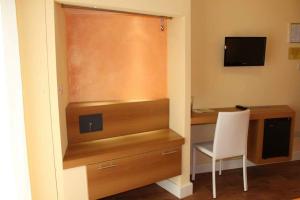 TV a/nebo společenská místnost v ubytování B&B Portacastello + 33 fotografií