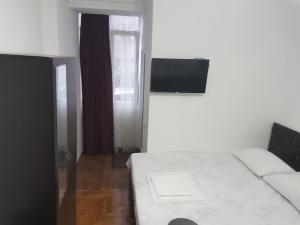 Postel nebo postele na pokoji v ubytování Pheria