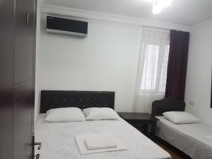 Postel nebo postele na pokoji v ubytování Pheria