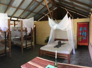 Postel nebo postele na pokoji v ubytování Amazonita Ecolodge