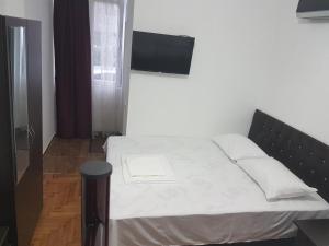 Postel nebo postele na pokoji v ubytování Pheria