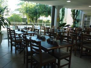 Camboinhas Beach Pousada 레스토랑 또는 맛집
