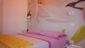 A bed or beds in a room at Kimberly House