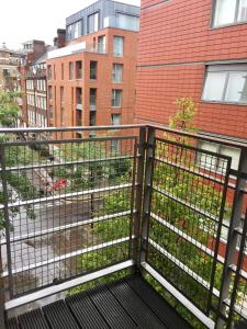 a balcony with a view of a city at Luxury Apartments in Westminster in London